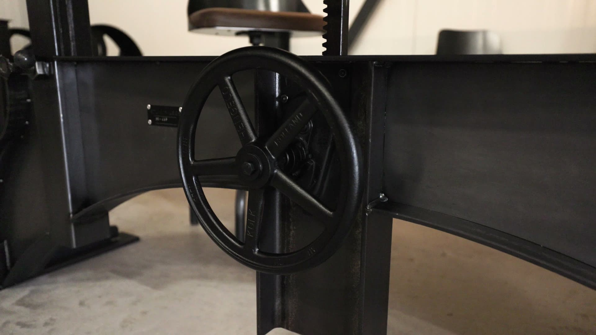 Handwheel of a height adjustable steel table base in the Sturdy Legs workshop
